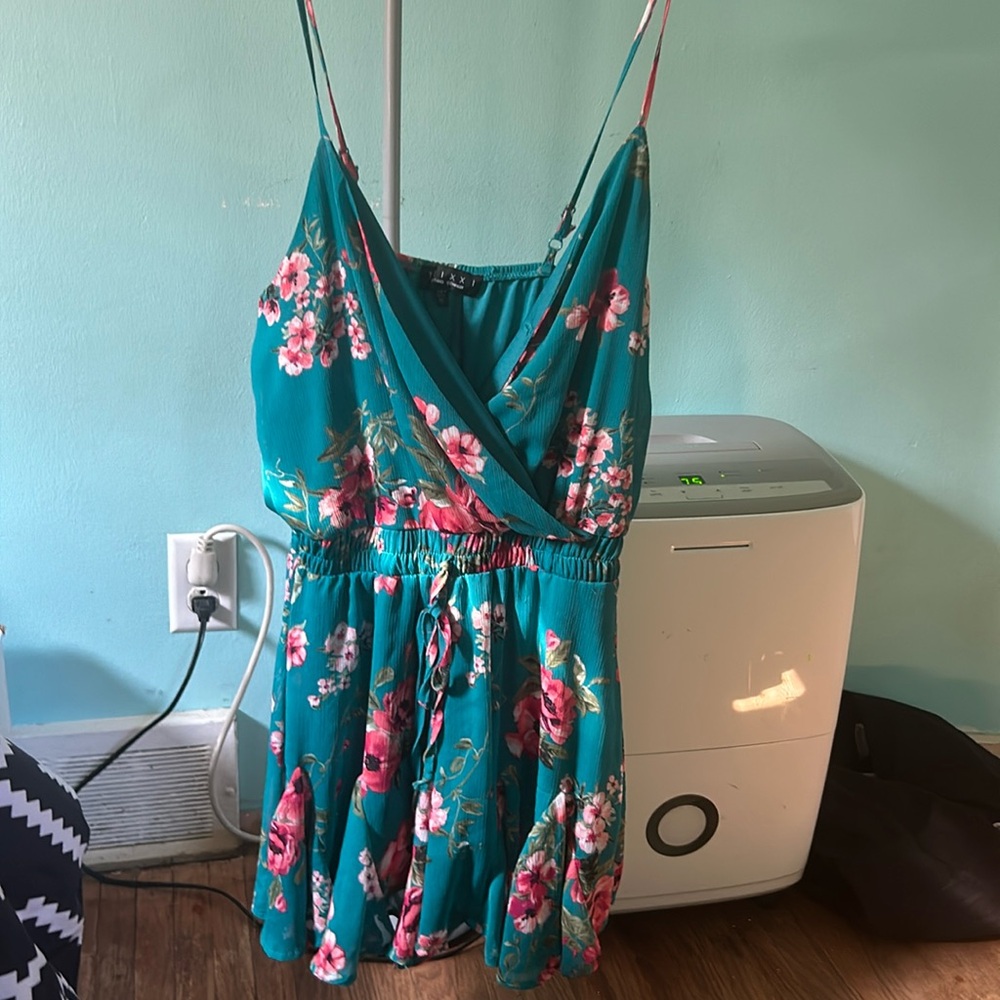 Blue flower romper from the company trixxi